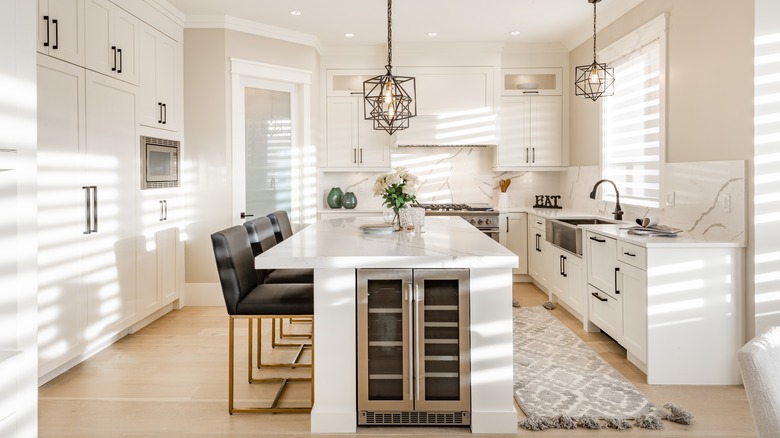 black barstools in kitchen island