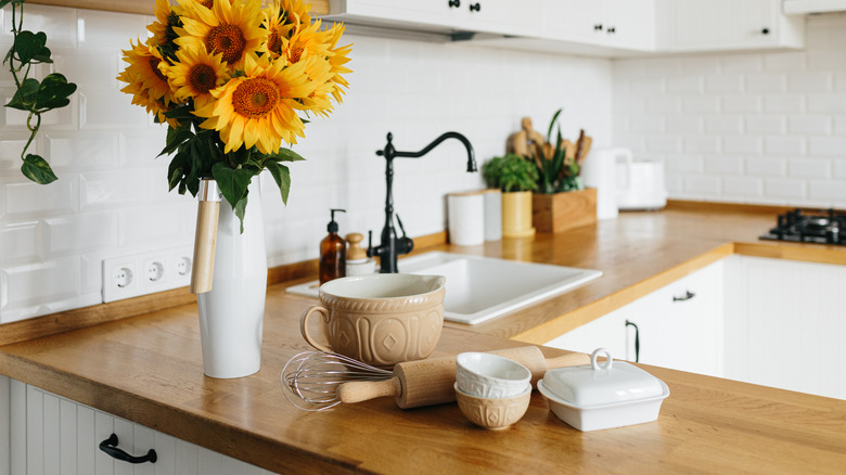 black pulls and knobs on white cabinets
