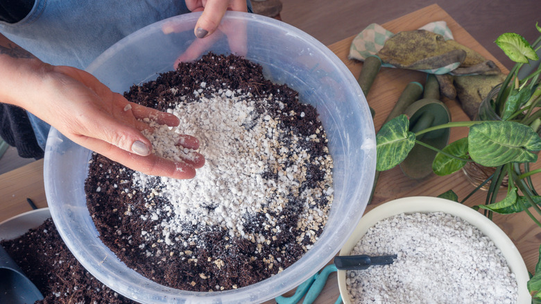 woman mixing soil 