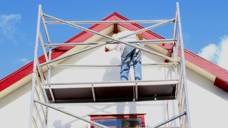 Construction worker on scaffolding