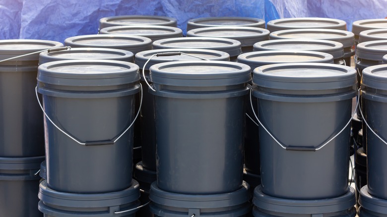 gray plastic buckets