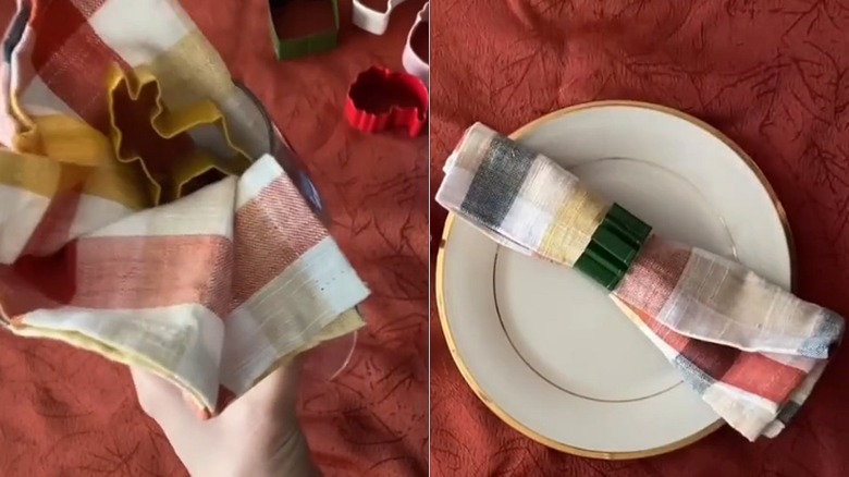 Left image of a napkin tucked into a glass with a cookie cutter accent, right image shows a cloth napkin through the center of a cookie cutter serving as the napkin ring
