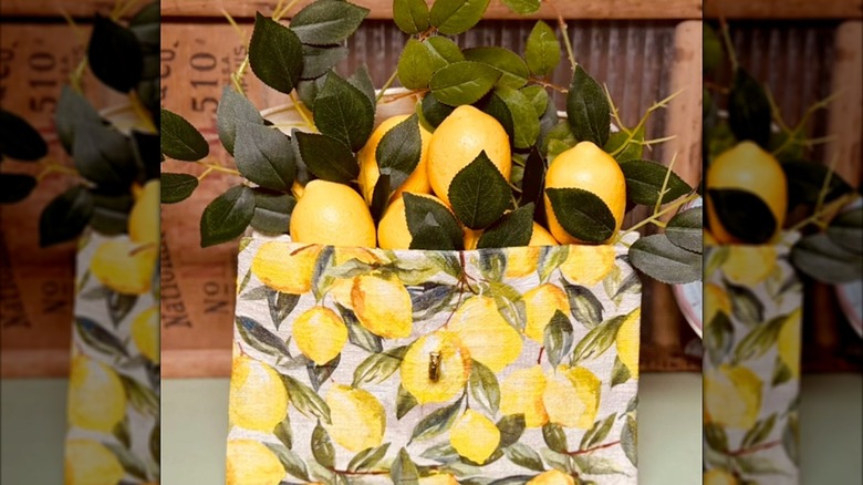 A lemon-inspired handbag with imitation lemons inside