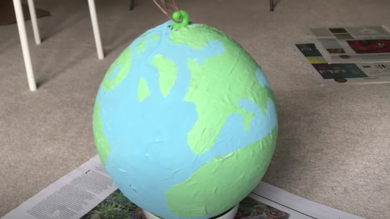 Paper mache globe made with a balloon