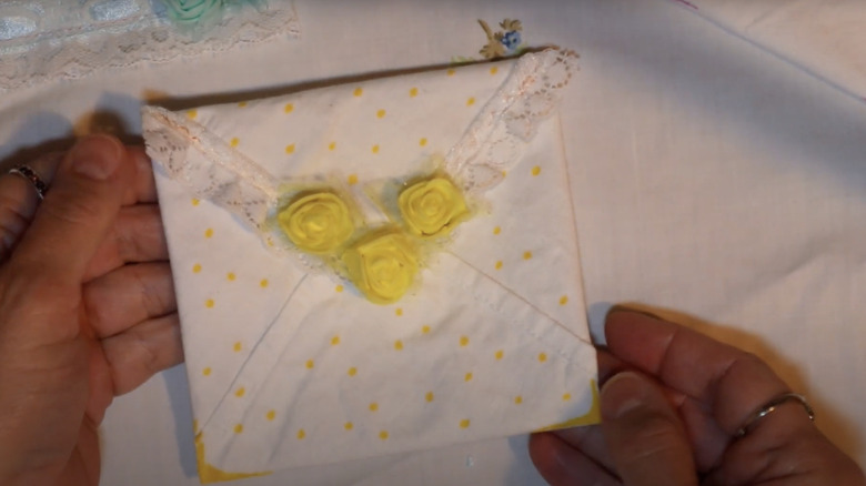 An envelope for holding old fashioned recipe cards made from a vintage handkerchief.