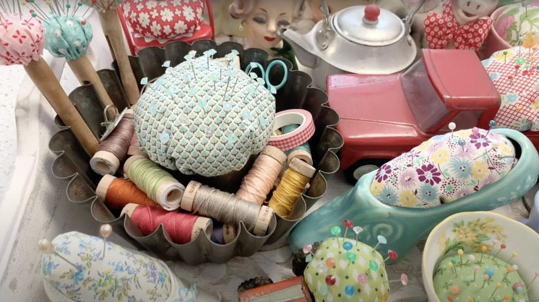 Pin cushions made from vintage hankies.