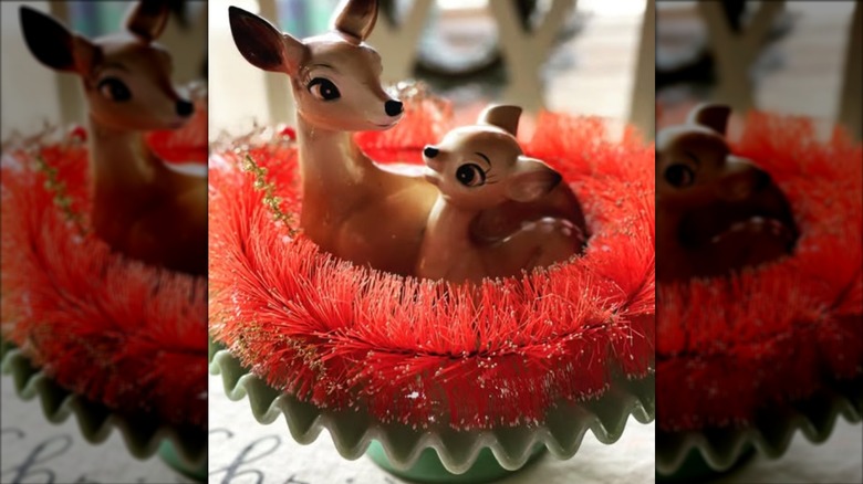 Vintage deer statue in holiday centerpiece