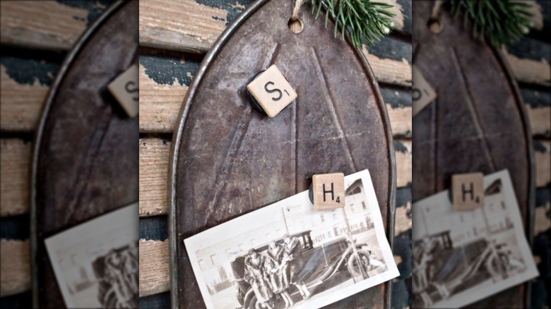 A simple vintage trivet used as a magnet board
