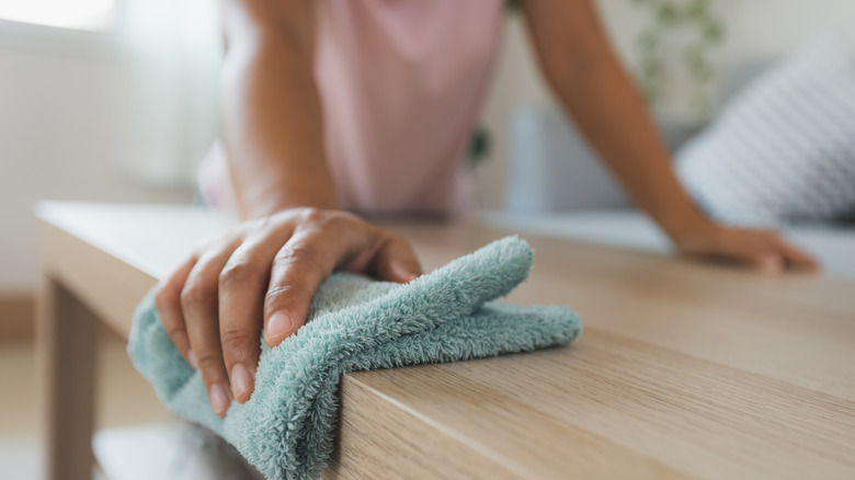 cleaning counter with rag 