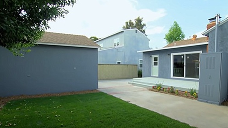 Quaint patio deck and lawn