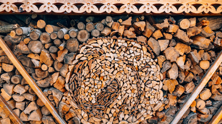 Rustic wood shed with carved wood lintel