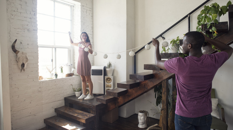 Couple hanging decor near stairwell