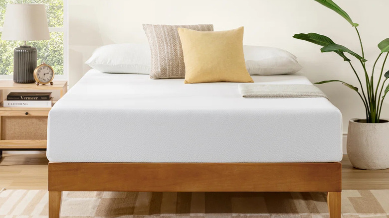 The Wayfair Sleep Memory Foam Mattress on a low-profile wood bedframe with neutral decor in the background