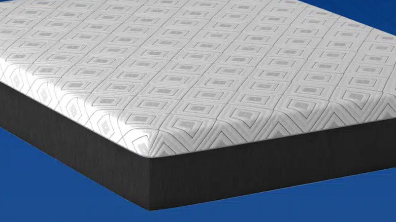 The Sealy Cool 12-inch Memory Foam Mattress against a blue background