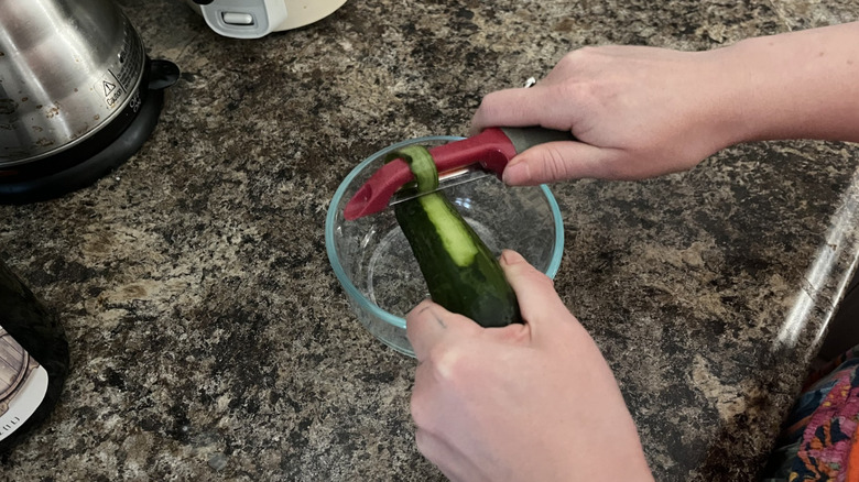A bag of mini cucumbers from Aldi on kitchen table