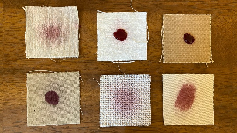 Fabric swatches with wine stains