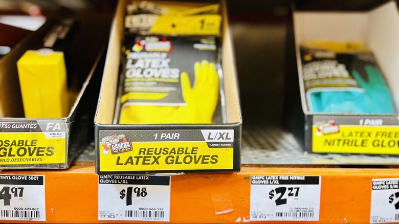 latex yellow gloves on shelf