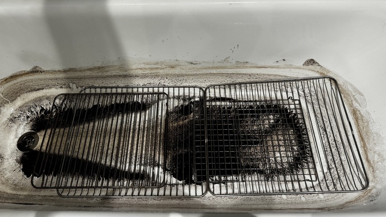 Coffee grounds, grates in tub