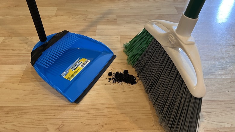 DIY dustpan used with broom