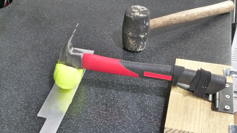 Improvised mallet on test rig