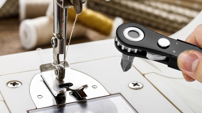 Off set screwdriver being used to repair sewing machine