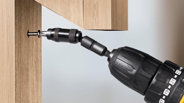 Close up of using a pivot drill bit holder