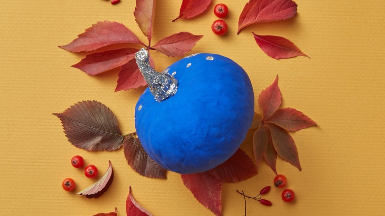 Pumpkin painted bright blue