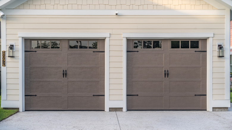 Two sets of carriage-style garage doors