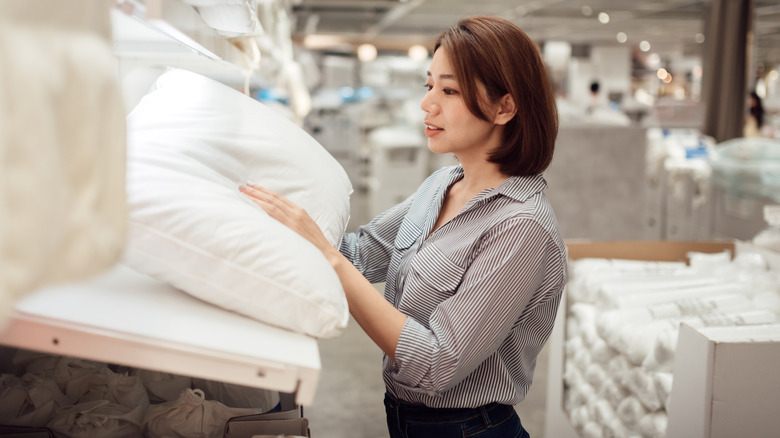 person shopping for pillows