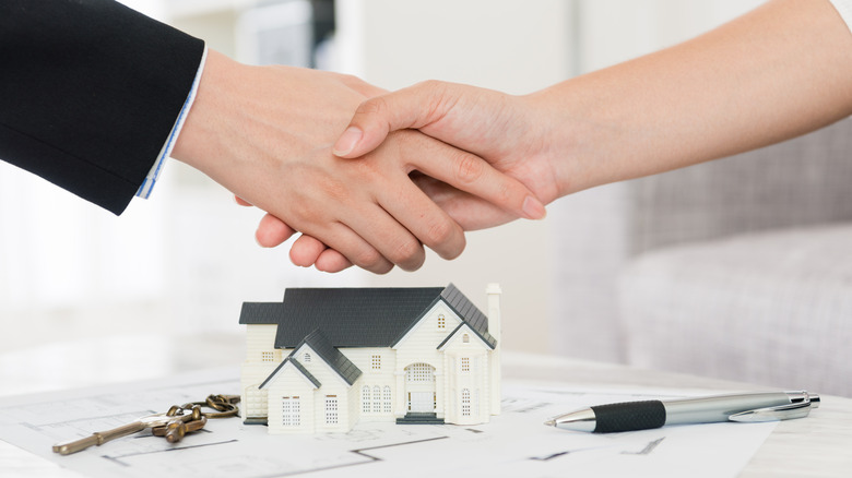 two people shaking hands