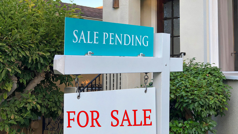 sale sign outside of house