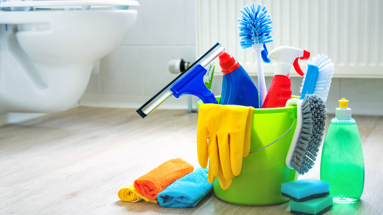 bucket with household cleaning products