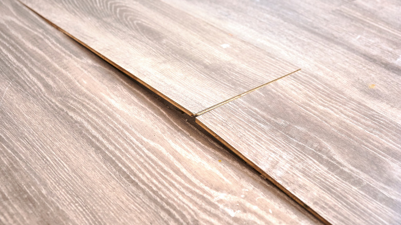 Damaged wood plank flooring
