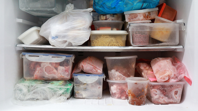 Packed freezer with exposed lines 