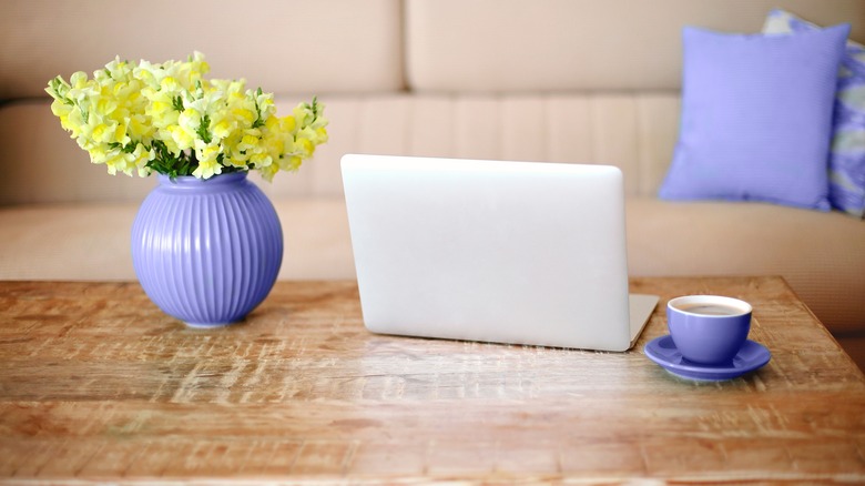 vase of flowers and laptop