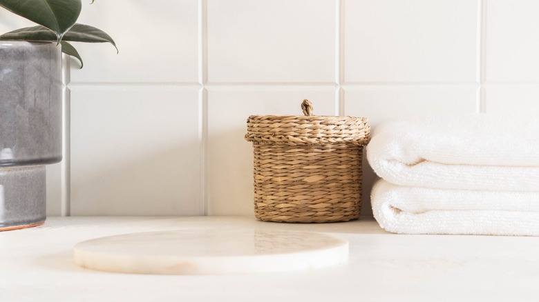 bathroom countertop and tile wall