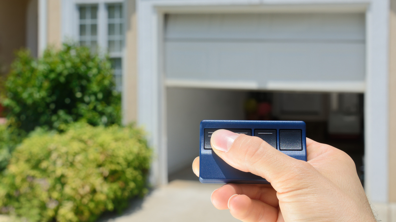 What Do The 3 Different Buttons On A Garage Door Opener Do?