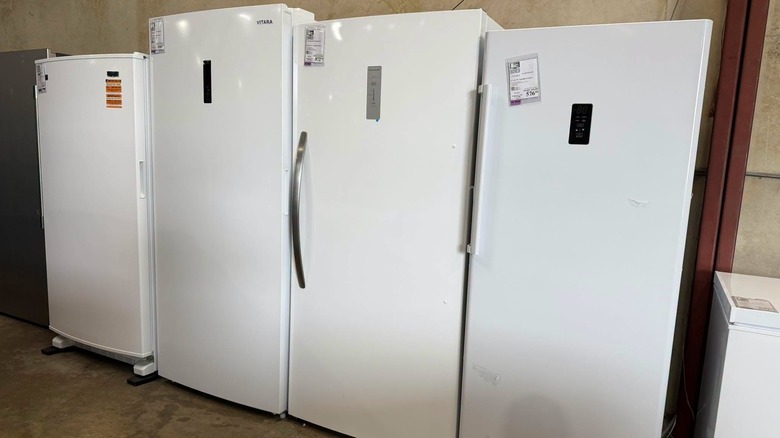 Various white upright convertible freezers for sale
