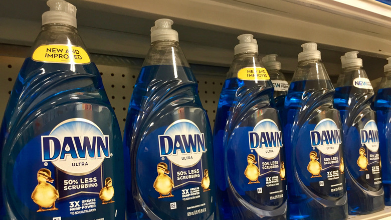 A shelf full of Dawn dish soap inside of a store.