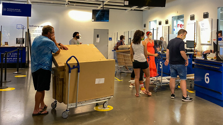 Customers waiting in line to return items at IKEA