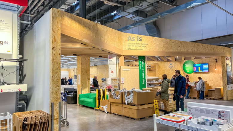 The As-is section in an IKEA store, featuring used furniture