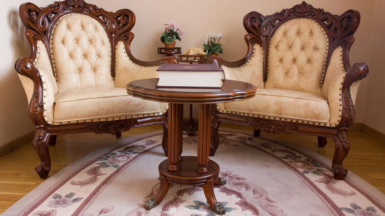 Victorian era chairs and table with claw feet