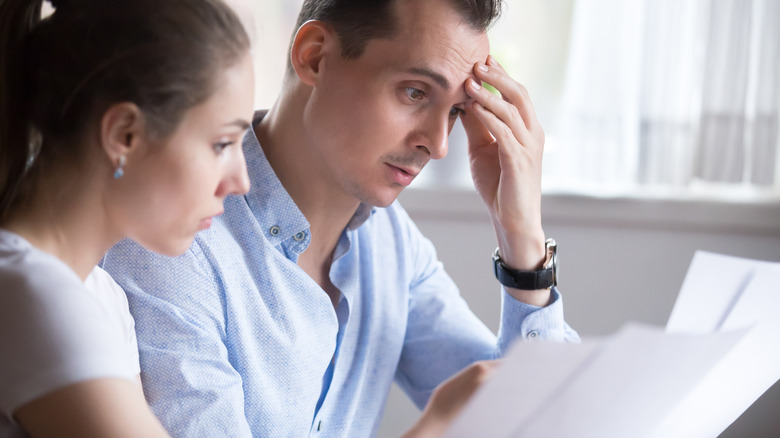 People reviewing lease