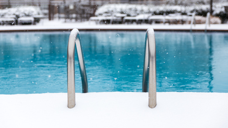 Snowy swimming pool ladder