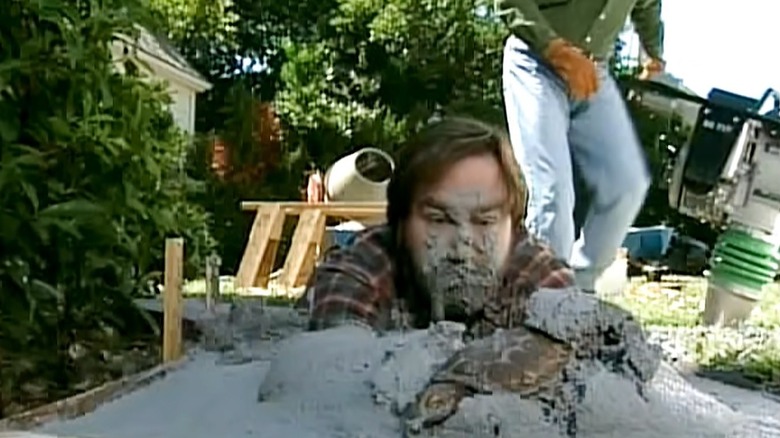 Al falling into concrete