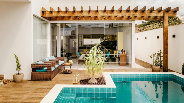 brown wooden pergola in backyard