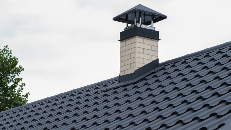 chimney on a dark roof