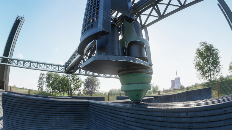 Machine 3D printing the exterior of a house