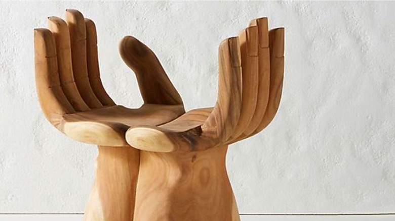 Two wooden hand chairs