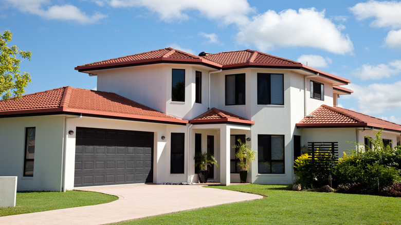 Multi-level home with red roof